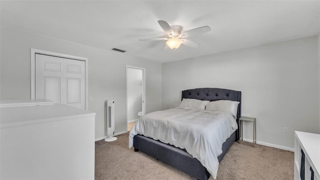 934 Point View Ln, Lakeland, FL 33813 - bedroom featuring light carpet, baseboards, and ceiling fan