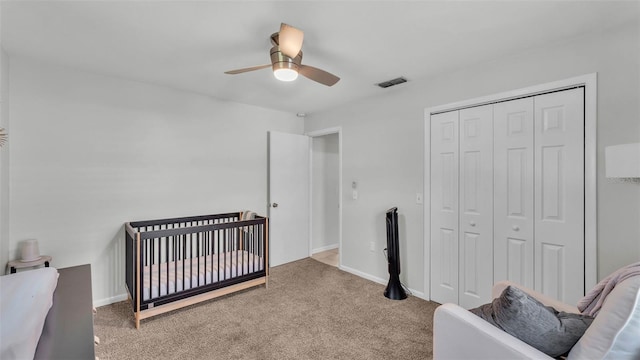 934 Point View Ln, Lakeland, FL 33813 - carpeted bedroom featuring a closet, ceiling fan, and baseboards