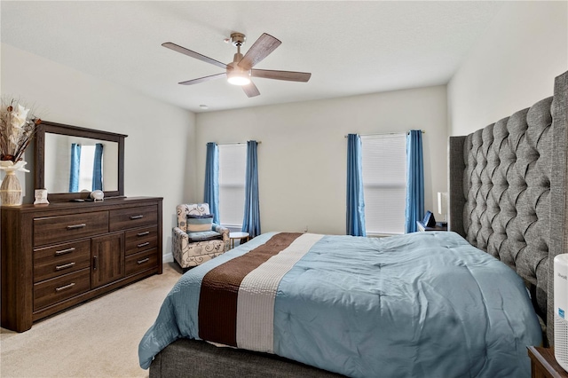 1371 Madison Cir, Haines City, FL 33844 - bedroom featuring light colored carpet, multiple windows, and ceiling fan