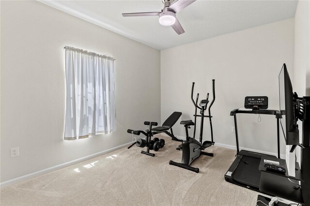 1371 Madison Cir, Haines City, FL 33844 - workout room featuring carpet, ceiling fan, and baseboards