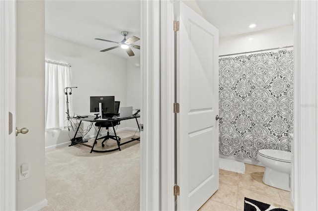 1371 Madison Cir, Haines City, FL 33844 - bathroom with toilet, a ceiling fan, and a shower with shower curtain