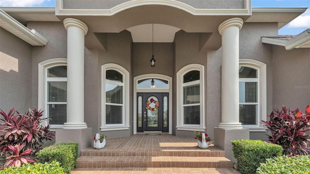 3121 Highlands By The Lake Way, Lakeland, FL 33812 - entrance to property featuring stucco siding and covered porch