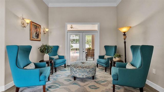 3121 Highlands By The Lake Way, Lakeland, FL 33812 - living area featuring ornamental molding, french doors, and wood finished floors