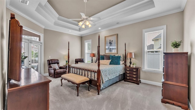 3121 Highlands By The Lake Way, Lakeland, FL 33812 - bedroom with crown molding, multiple windows, light colored carpet, a tray ceiling, and access to outside