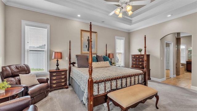 3121 Highlands By The Lake Way, Lakeland, FL 33812 - bedroom featuring arched walkways, ornamental molding, light colored carpet, recessed lighting, and a ceiling fan