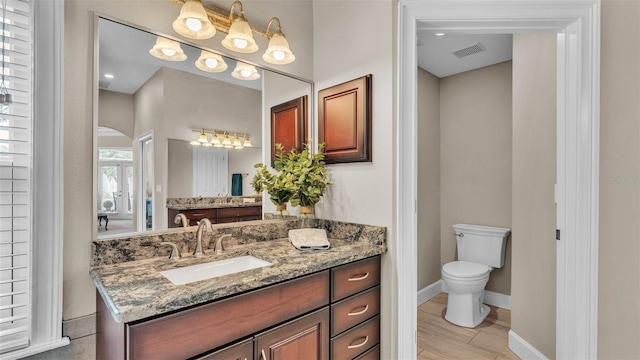 3121 Highlands By The Lake Way, Lakeland, FL 33812 - bathroom with vanity and toilet