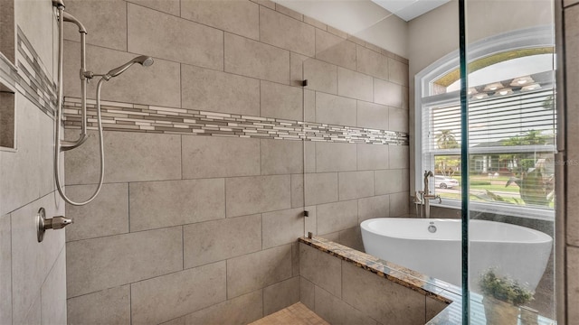 3121 Highlands By The Lake Way, Lakeland, FL 33812 - full bathroom with a freestanding bath and tiled shower