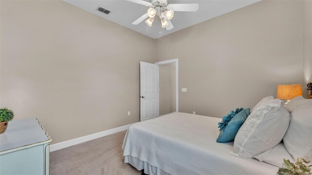 3121 Highlands By The Lake Way, Lakeland, FL 33812 - bedroom with light colored carpet and a ceiling fan