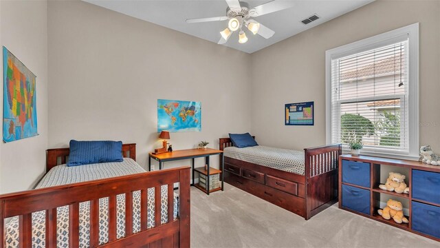 3121 Highlands By The Lake Way, Lakeland, FL 33812 - bedroom with carpet floors and ceiling fan