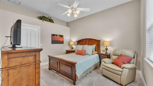 3121 Highlands By The Lake Way, Lakeland, FL 33812 - bedroom featuring light carpet and ceiling fan