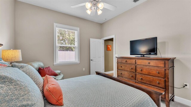 3121 Highlands By The Lake Way, Lakeland, FL 33812 - bedroom with carpet floors and a ceiling fan