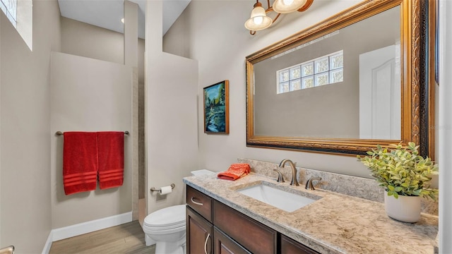 3121 Highlands By The Lake Way, Lakeland, FL 33812 - full bathroom featuring vanity and wood finished floors