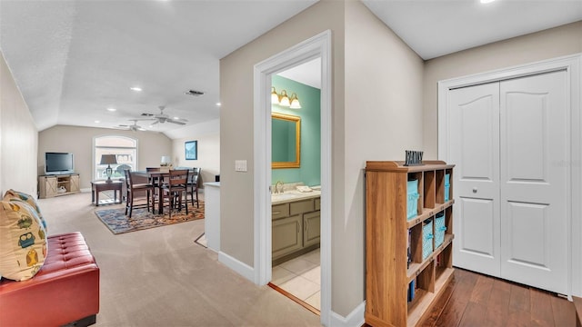 3121 Highlands By The Lake Way, Lakeland, FL 33812 - hallway featuring lofted ceiling and recessed lighting