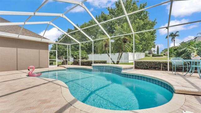 3121 Highlands By The Lake Way, Lakeland, FL 33812 - view of pool with a patio area and glass enclosure