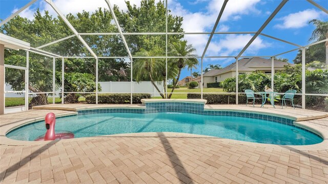 3121 Highlands By The Lake Way, Lakeland, FL 33812 - view of swimming pool featuring a patio area and a lanai