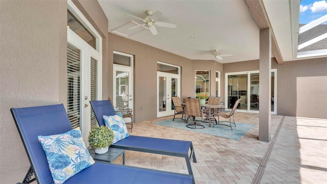 3121 Highlands By The Lake Way, Lakeland, FL 33812 - view of patio with ceiling fan, french doors, and outdoor dining area