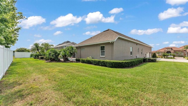 3121 Highlands By The Lake Way, Lakeland, FL 33812 - rear view of property featuring stucco siding