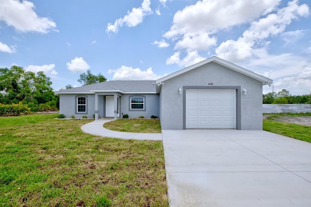 2438 W Wellston Rd, Avon Park, FL 33825 - single story home featuring concrete driveway, a front lawn, stucco siding, and a garage