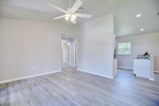 2438 W Wellston Rd, Avon Park, FL 33825 - empty room featuring ceiling fan, wood finished floors, baseboards, recessed lighting, and attic access