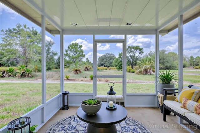 2438 W Wellston Rd, Avon Park, FL 33825 - sunroom / solarium featuring plenty of natural light and view of scattered trees