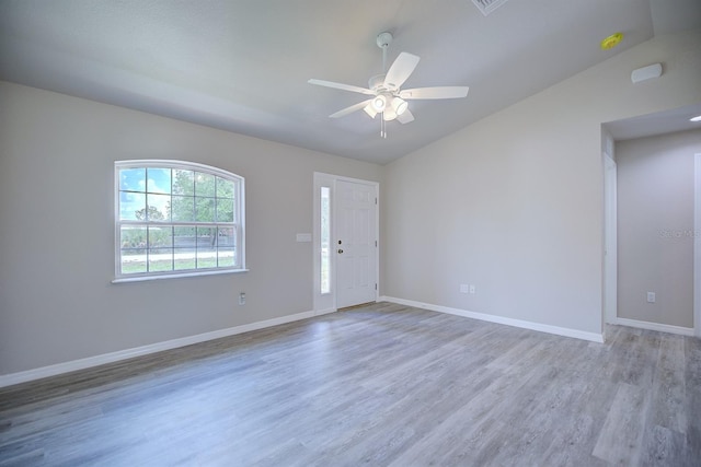 2438 W Wellston Rd, Avon Park, FL 33825 - entryway with vaulted ceiling, wood finished floors, baseboards, and a ceiling fan