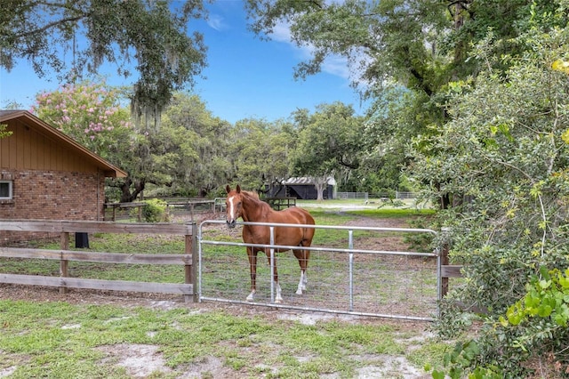 6819 Broken Arrow Trl S, Lakeland, FL 33813 - view of yard with an outbuilding, an exterior structure, and a view of rural / pastoral area