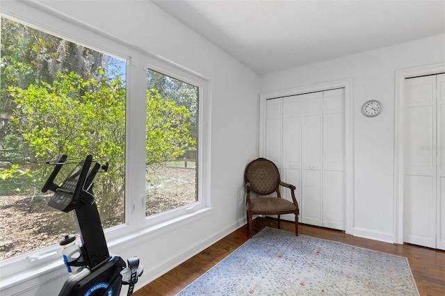 6819 Broken Arrow Trl S, Lakeland, FL 33813 - sitting room with wood finished floors and baseboards