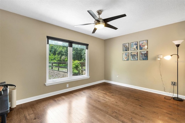 6819 Broken Arrow Trl S, Lakeland, FL 33813 - empty room featuring wood finished floors and a ceiling fan