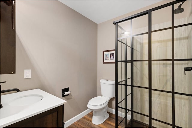 6819 Broken Arrow Trl S, Lakeland, FL 33813 - bathroom featuring wood finished floors, vanity, and a shower