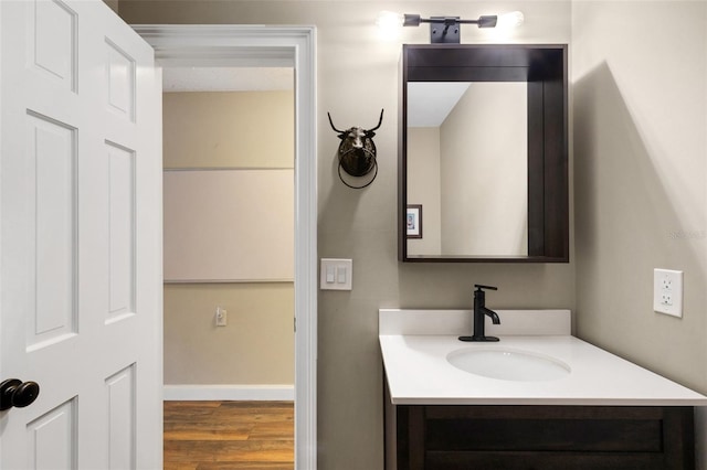 6819 Broken Arrow Trl S, Lakeland, FL 33813 - bathroom with vanity and wood finished floors