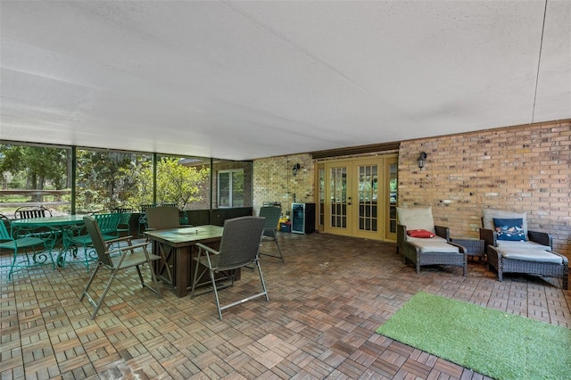 6819 Broken Arrow Trl S, Lakeland, FL 33813 - view of patio / terrace featuring french doors and outdoor dining area