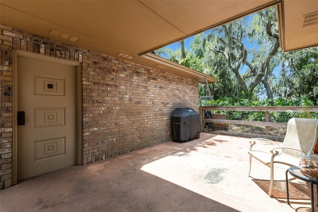 6819 Broken Arrow Trl S, Lakeland, FL 33813 - view of patio / terrace featuring grilling area
