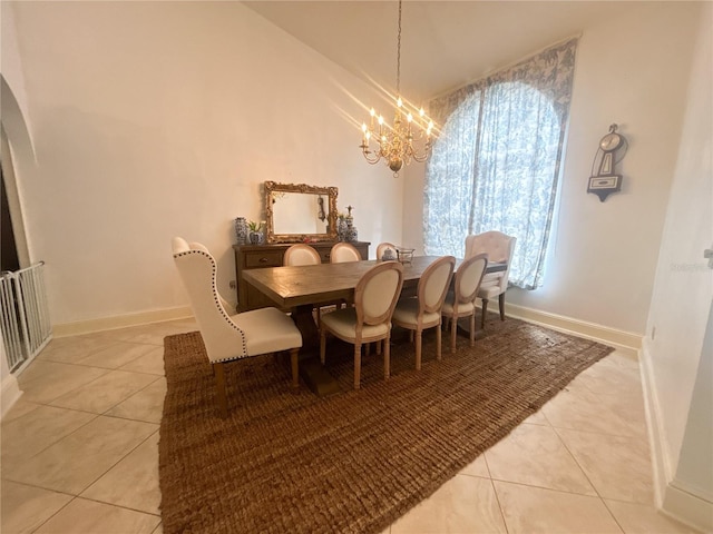 1909 Masters Way, Plant City, FL 33566 - dining space featuring light tile patterned floors, a chandelier, and arched walkways