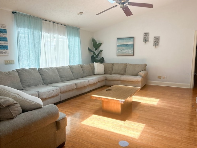 1909 Masters Way, Plant City, FL 33566 - living room featuring vaulted ceiling, wood finished floors, and ceiling fan