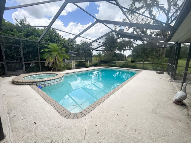 1909 Masters Way, Plant City, FL 33566 - view of pool featuring a patio area, a pool with connected hot tub, and a lanai