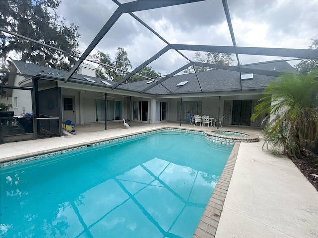 1909 Masters Way, Plant City, FL 33566 - view of pool with a patio area, a lanai, a ceiling fan, and a pool with connected hot tub