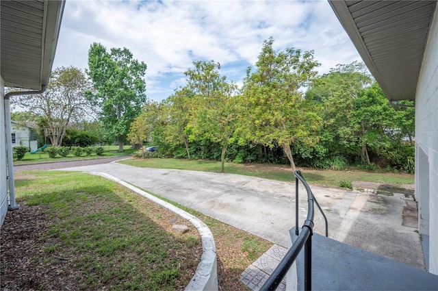 818 Woodward St, Lakeland, FL 33803 - view of grassy yard featuring a patio area