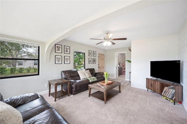 818 Woodward St, Lakeland, FL 33803 - living area featuring plenty of natural light, light colored carpet, and baseboards