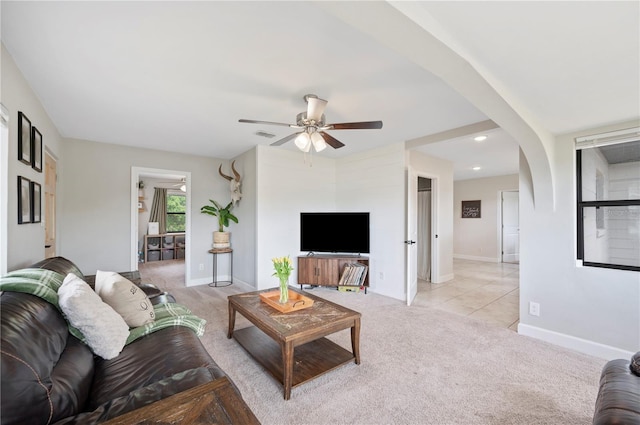 818 Woodward St, Lakeland, FL 33803 - living room featuring a ceiling fan, light colored carpet, baseboards, arched walkways, and recessed lighting