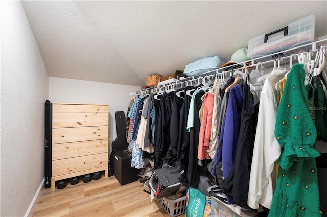 818 Woodward St, Lakeland, FL 33803 - walk in closet featuring wood finished floors