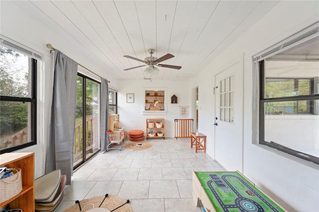 818 Woodward St, Lakeland, FL 33803 - sunroom featuring tile patterned flooring