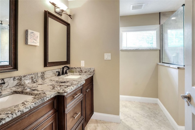 1300 Ariana Woods Cir, Auburndale, FL 33823 - full bath with double vanity, a shower, and marble look tiles