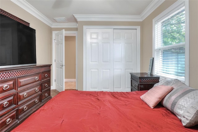 1300 Ariana Woods Cir, Auburndale, FL 33823 - tiled bedroom with ornamental molding and a closet