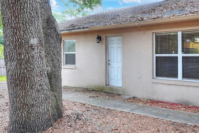 1300 Ariana Woods Cir, Auburndale, FL 33823 - property entrance featuring stucco siding