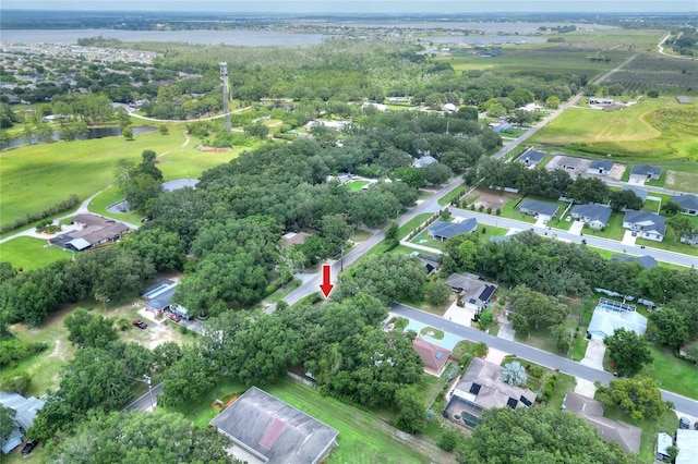 1300 Ariana Woods Cir, Auburndale, FL 33823 - aerial overview of property's location with a large body of water, nearby suburban area, and a golf course