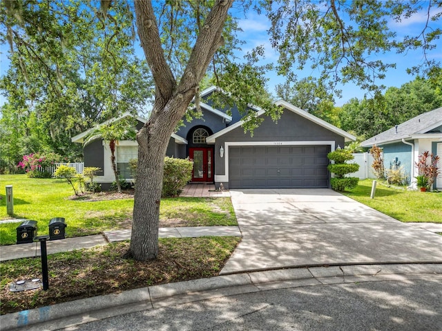 16804 Hawkridge Rd, Lithia, FL 33547 - view of front of home with a garage and concrete driveway
