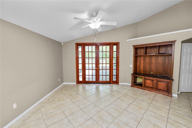 16804 Hawkridge Rd, Lithia, FL 33547 - empty room featuring lofted ceiling, french doors, a ceiling fan, light tile patterned floors, and baseboards