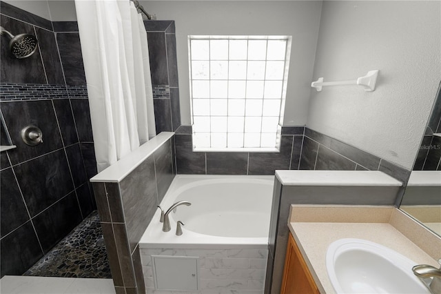 16804 Hawkridge Rd, Lithia, FL 33547 - bathroom with a bath, tiled shower, plenty of natural light, and vanity