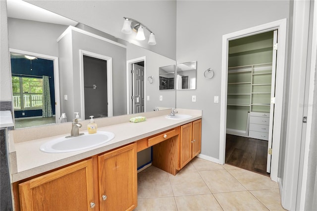 16804 Hawkridge Rd, Lithia, FL 33547 - full bathroom with double vanity and tile patterned floors