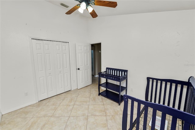 16804 Hawkridge Rd, Lithia, FL 33547 - bedroom with light tile patterned flooring, lofted ceiling, a closet, and ceiling fan